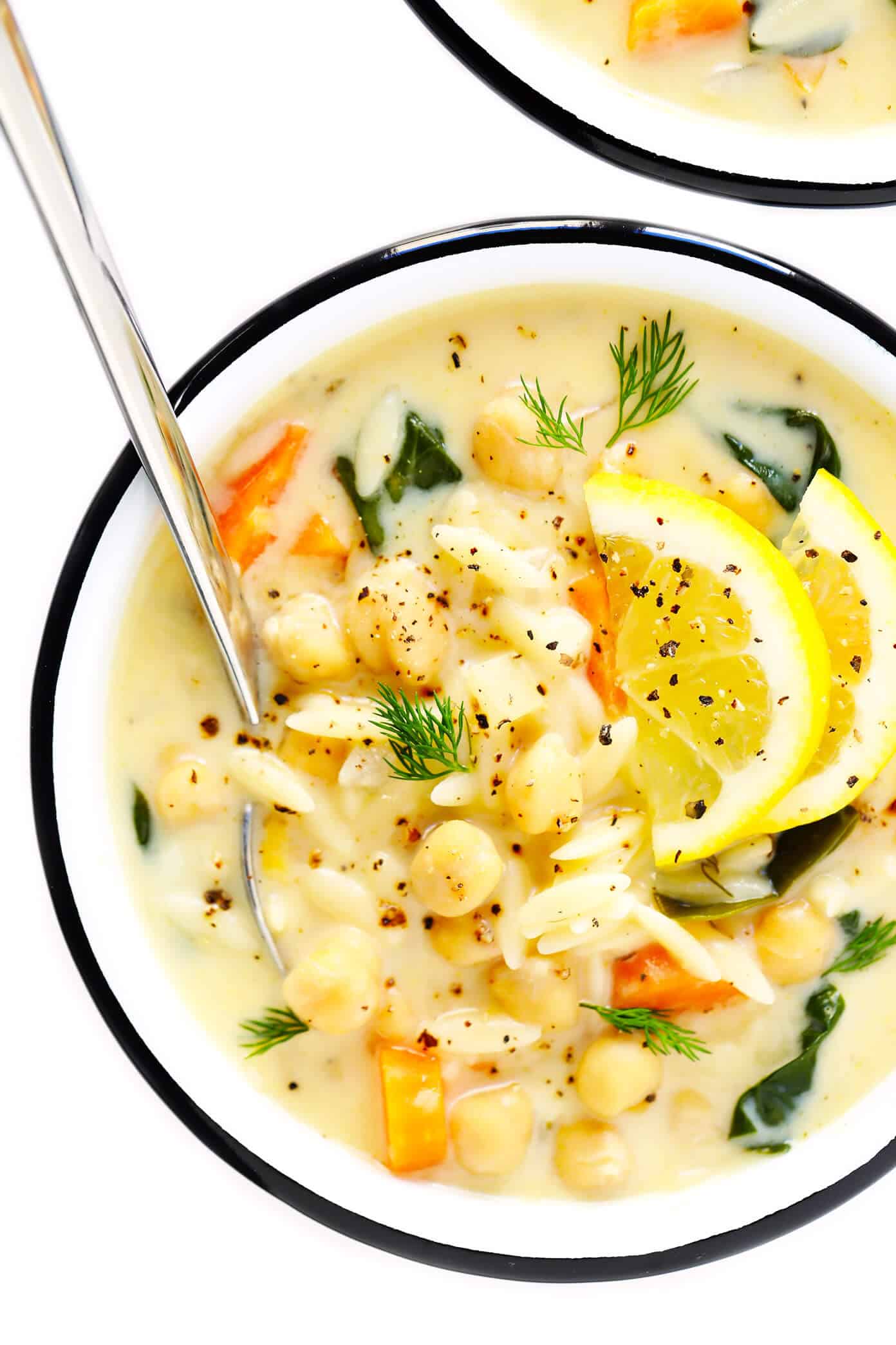 LOVE this Lemony Orzo Chickpea Soup recipe! It's a vegetarian spin on Greek avgolemono soup, brightened up with lots of lemon juice and fresh herbs, and made extra creamy by folding a few eggs into the broth (instead of cream). It's the perfect light vegetarian soup recipe! | gimmesomeoven.com #soup #healthy #vegetarian #greek #lemon #orzo #dinner #mealprep Lemony Orzo Chickpea Soup